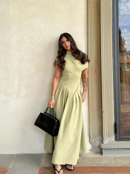 Choose the Diagonal Collar Pleated Summer Dress with a chic collar and pleated details. Great for the office and stylish outings.