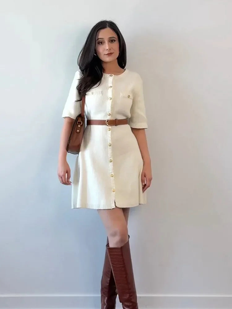 Find the Fitted Knit Mini Dress with a soft stretch, O-neck, and mini length. A chic choice for office days and outings.