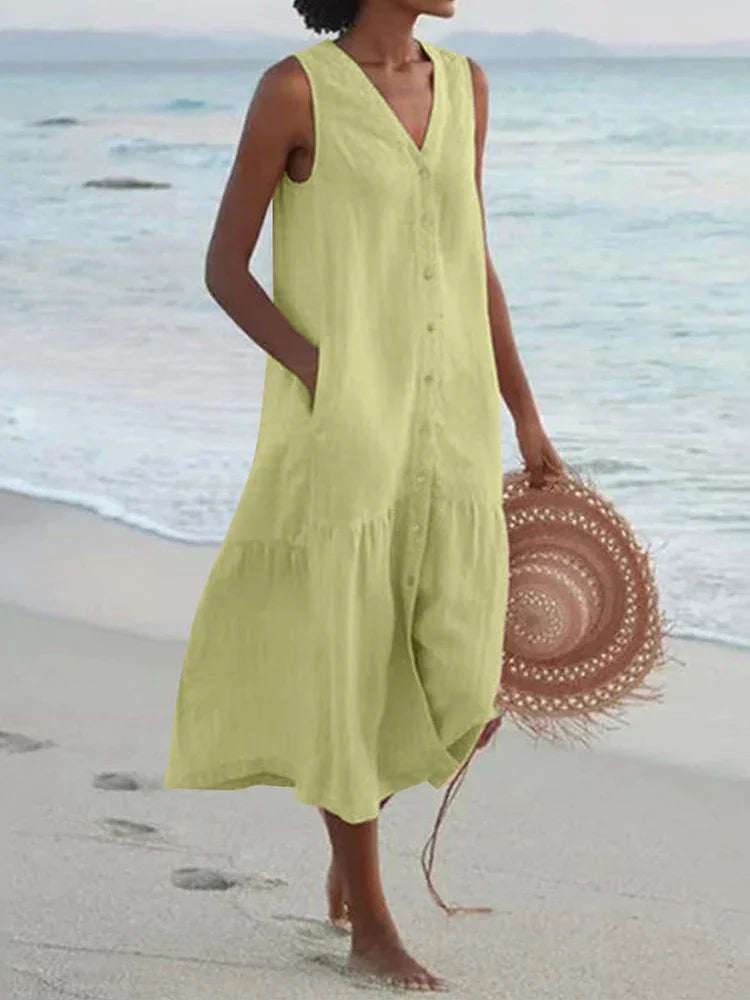 Looking for a V Neck Midi Dress? Enjoy a loose A-line fit, cotton fabric, and convenient pockets for effortless summer style.