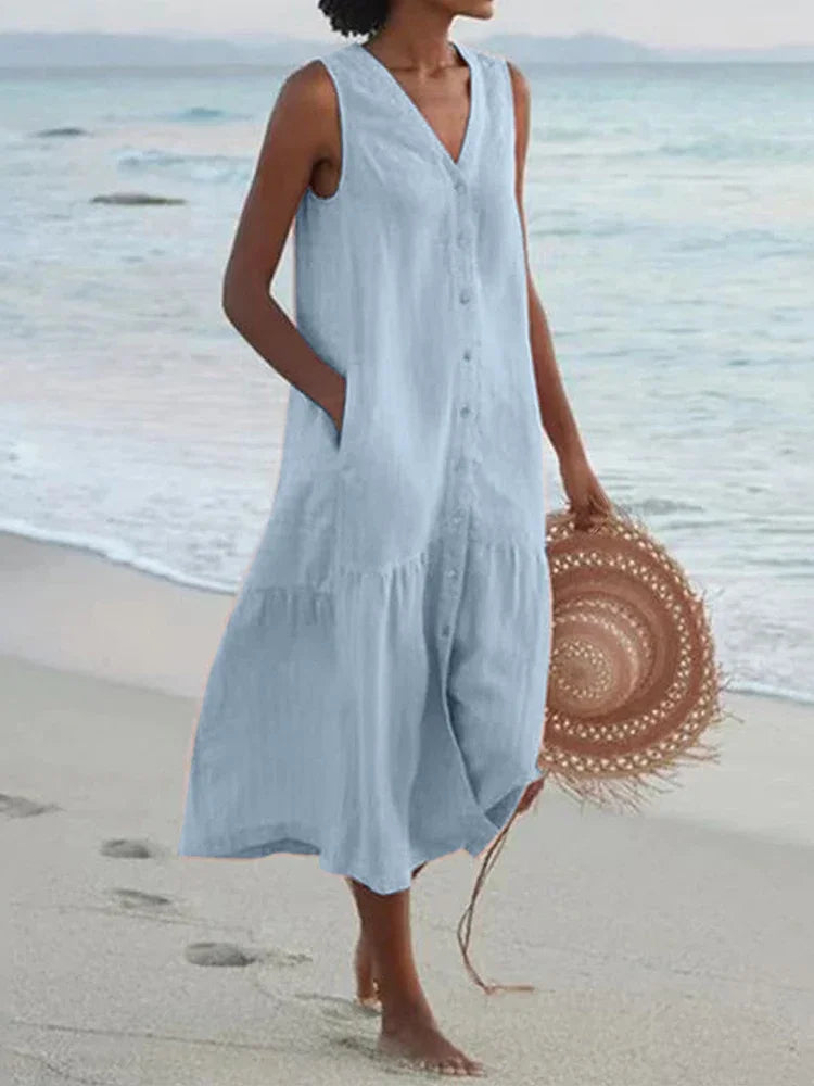Looking for a V Neck Midi Dress? Enjoy a loose A-line fit, cotton fabric, and convenient pockets for effortless summer style.