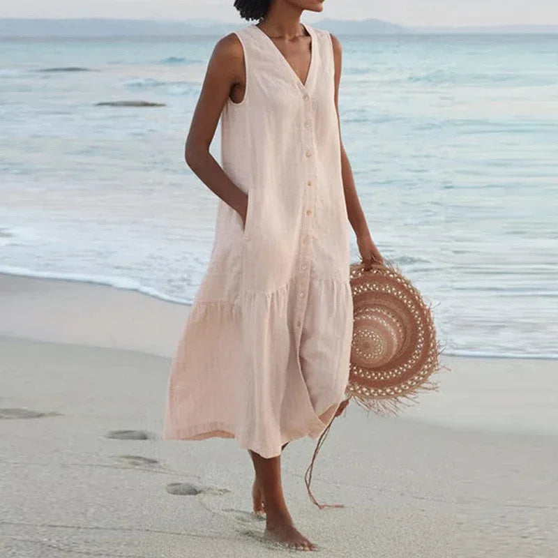 Looking for a V Neck Midi Dress? Enjoy a loose A-line fit, cotton fabric, and convenient pockets for effortless summer style.