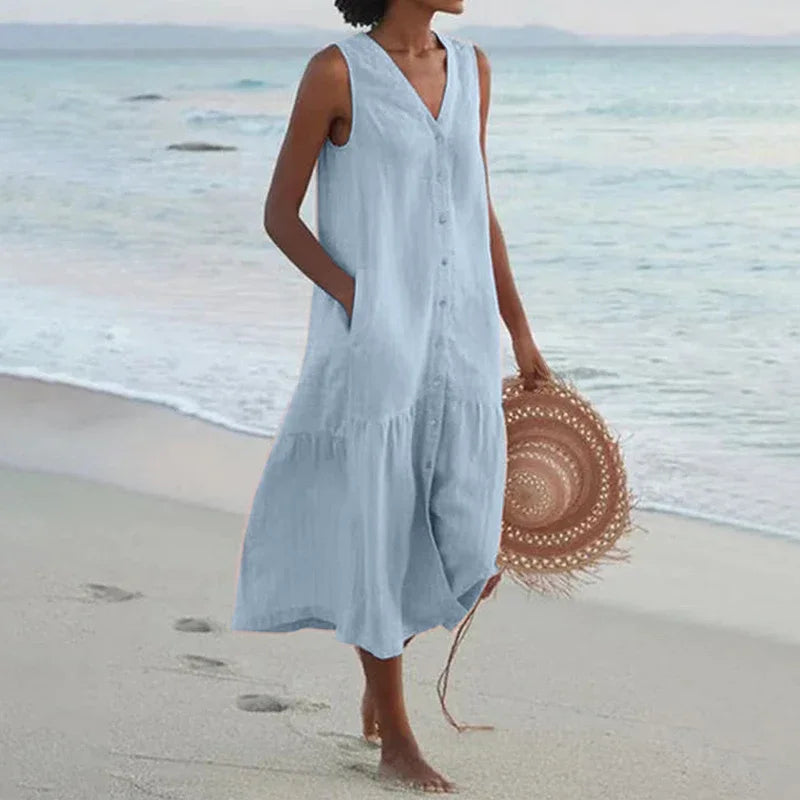 Looking for a V Neck Midi Dress? Enjoy a loose A-line fit, cotton fabric, and convenient pockets for effortless summer style.