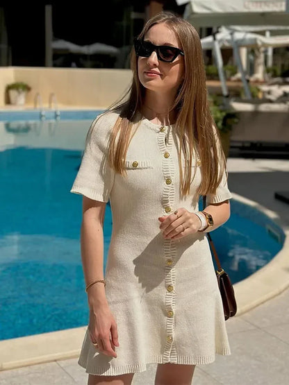 Find the Fitted Knit Mini Dress with a soft stretch, O-neck, and mini length. A chic choice for office days and outings.