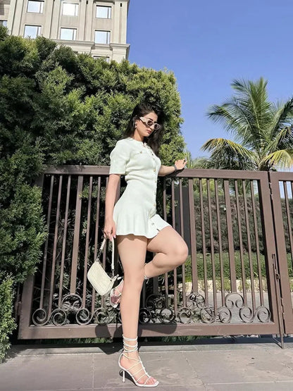 Find the Fitted Knit Mini Dress with a soft stretch, O-neck, and mini length. A chic choice for office days and outings.