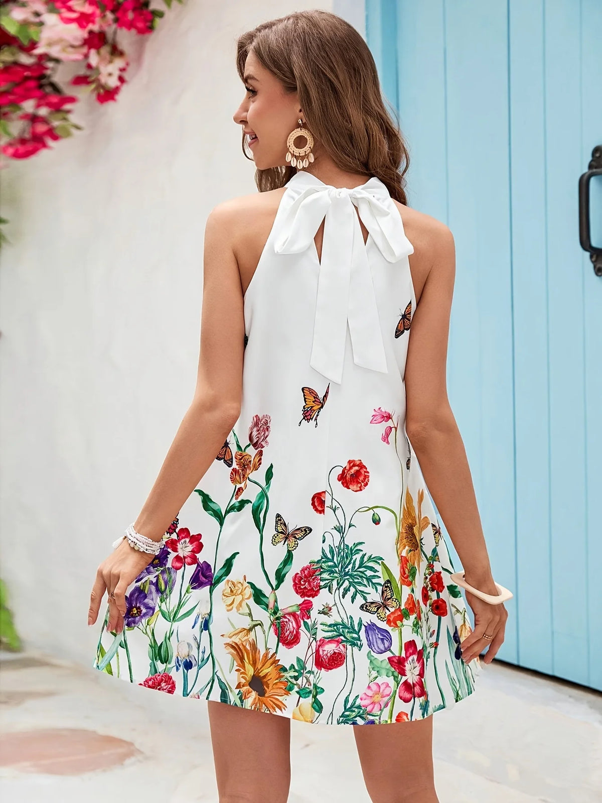 Looking for Best Beach Dresses? Choose this stylish sleeveless dress with a loose fit and a printed design, perfect for vacations.