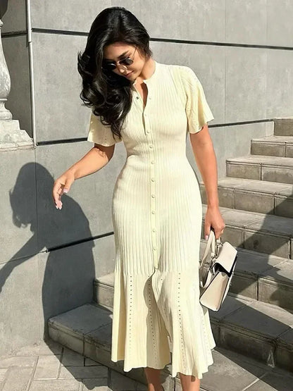 Shop knitted maxi dresses featuring stylish hollow-out designs, soft fabrics, and flattering silhouettes. Find versatile styles.