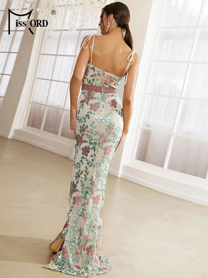 Make a statement with a spaghetti strap formal dress featuring sparkling sequin details & a graceful fit for special occasions.