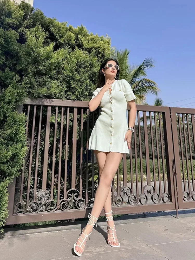 Find the Fitted Knit Mini Dress with a soft stretch, O-neck, and mini length. A chic choice for office days and outings.