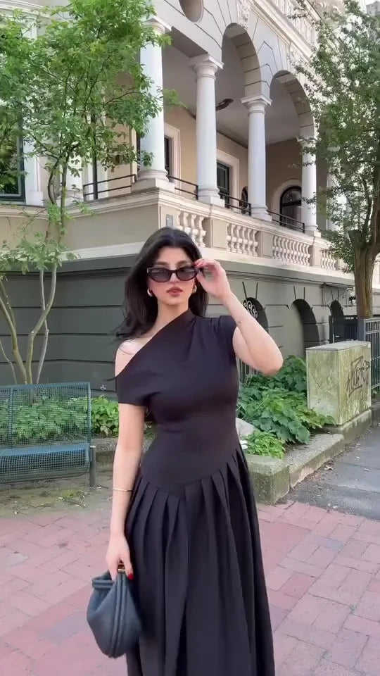 Choose the Diagonal Collar Pleated Summer Dress with a chic collar and pleated details. Great for the office and stylish outings.