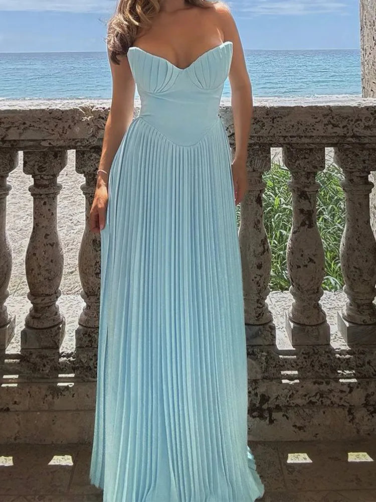 Elevate your occasion wardrobe with the Off-Shoulder Pleated Maxi Dress, featuring a sleek silhouette, and ankle-length design.