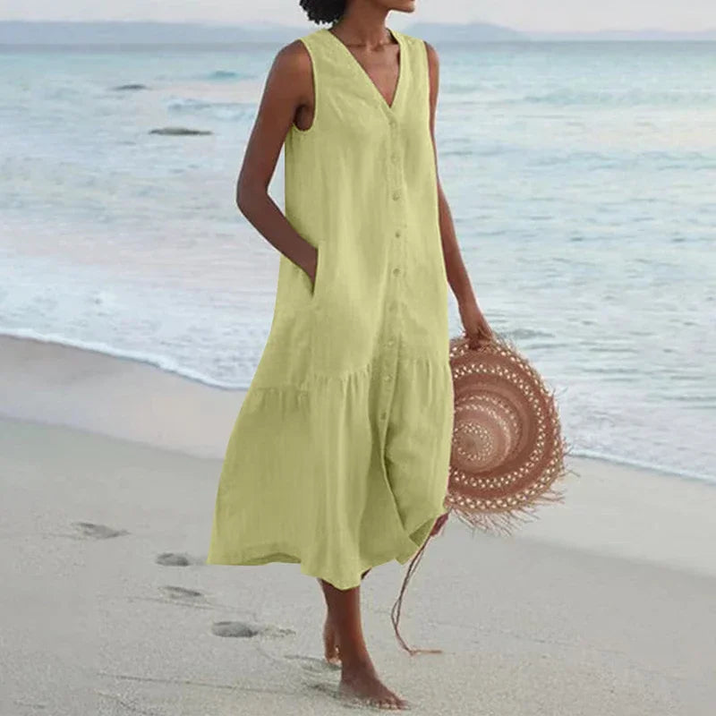 Looking for a V Neck Midi Dress? Enjoy a loose A-line fit, cotton fabric, and convenient pockets for effortless summer style.