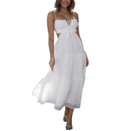 Find a White Maxi Beach Dress with an elegant strapless style and ruffle details. Perfect for summer outings and beach days.