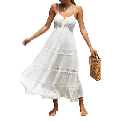 Find a White Maxi Beach Dress with an elegant strapless style and ruffle details. Perfect for summer outings and beach days.